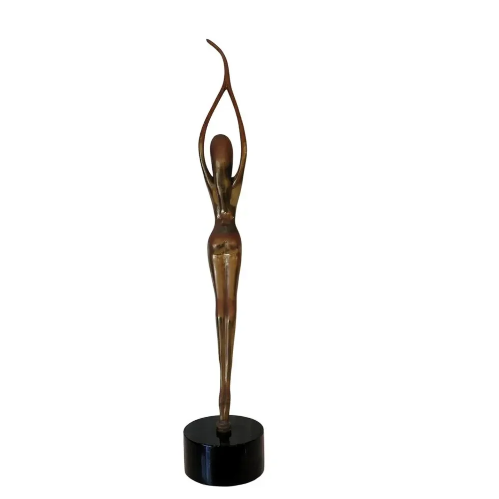 Vintage Mid-Century Modern (MCM) brass sculpture of an elongated female figure